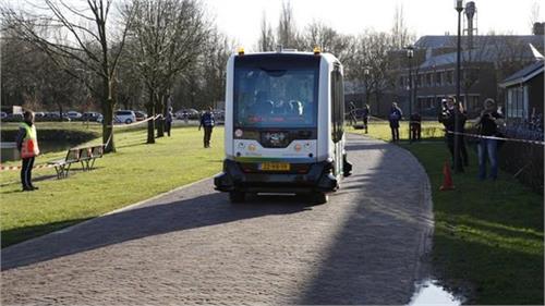 driverless shuttle on road