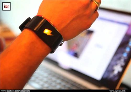 wristband will give you a 255 volt shock when you spend too much money