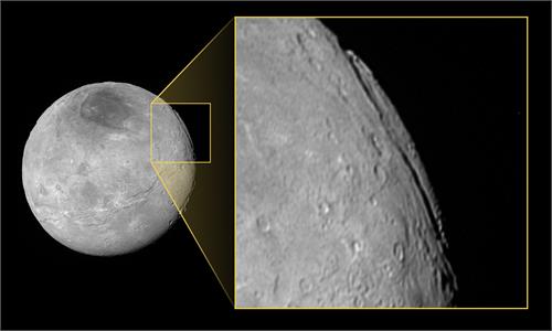 pluto s moon have a giant grand canyon