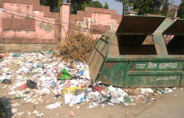 district administrative complex and piles of filth out of the court