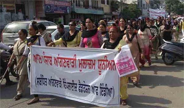 a protest by anganwari workers and helpers