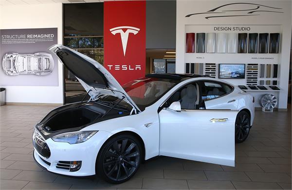 setback to modis make in india tesla to build plant in china
