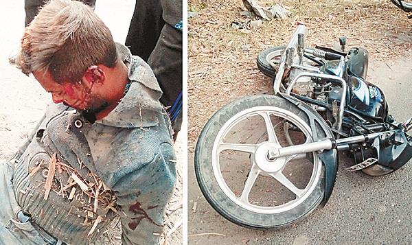 injured motorcycle driver on a car collision