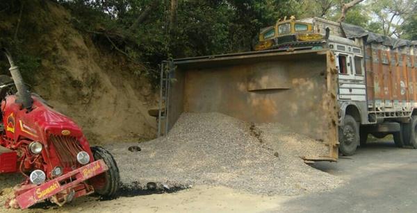 a collision in trucks and tractor trolley  one  s death