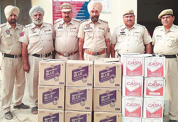 smuggler carrying liquor hit the policeman standing on the nak