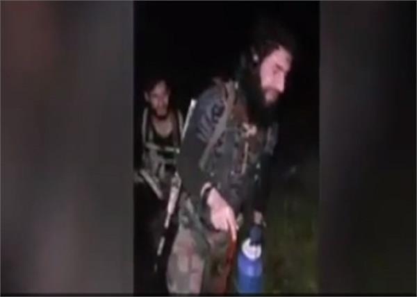 wanted terrorist zakir musa showing the crossing of the forest