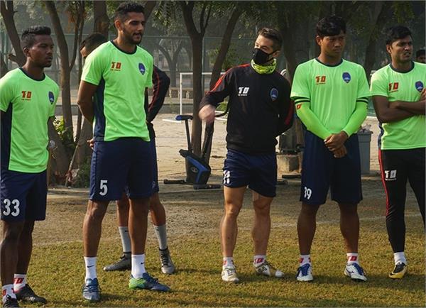 footballers practice for isl matches by wearing masks