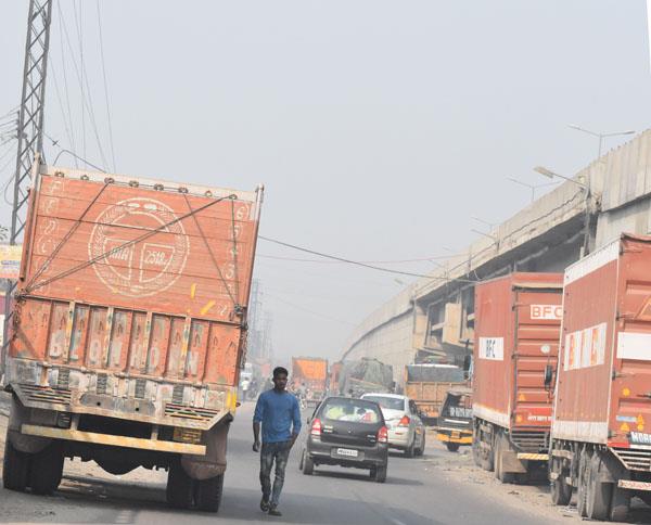 due to tragic accidents  truck lockers standing on the roads side