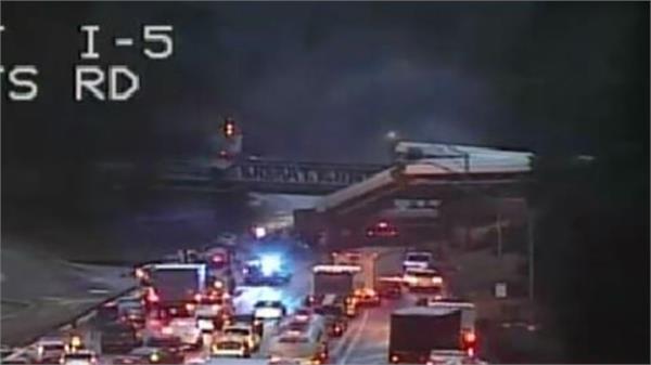 passenger train derails onto busy highway in washington state
