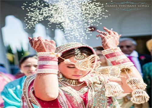 why is throwing rice at a wedding ceremony