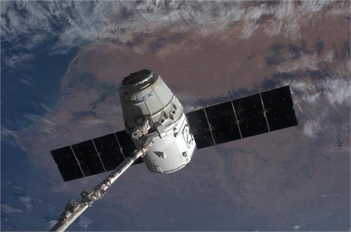 spacex cargo ship returns to earth