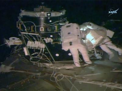 big setback for nasa astronauts on a spacewalk lose key piece of international space station