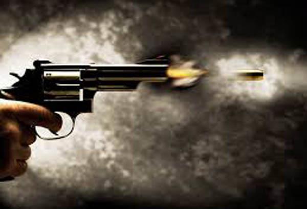 a bullet shot by panchayat land grabbing  2 injured