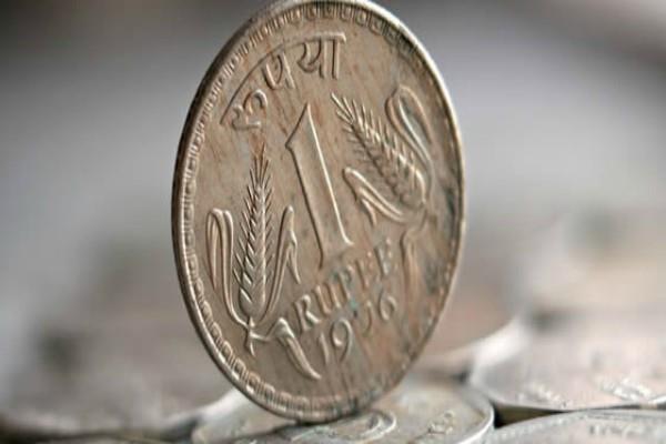 rupee up 4 paise against dollar