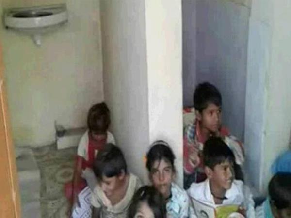 school building not built after 5 years forced to sit in toilet