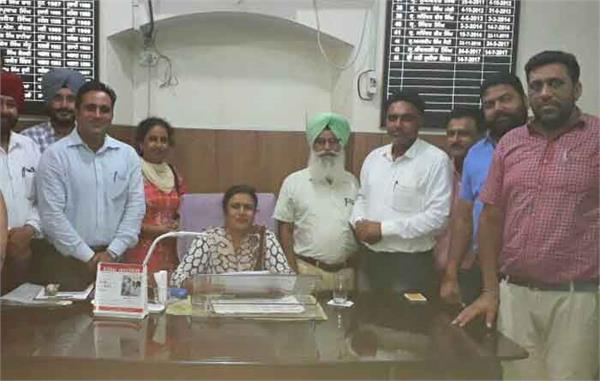 to make the district education officer aware of the burning demands