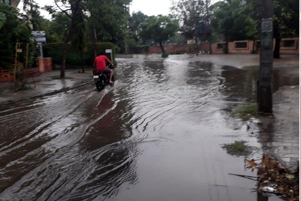 water logged city with fast rain