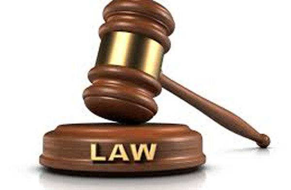 the case against three on the uniform of the woman police officer washed