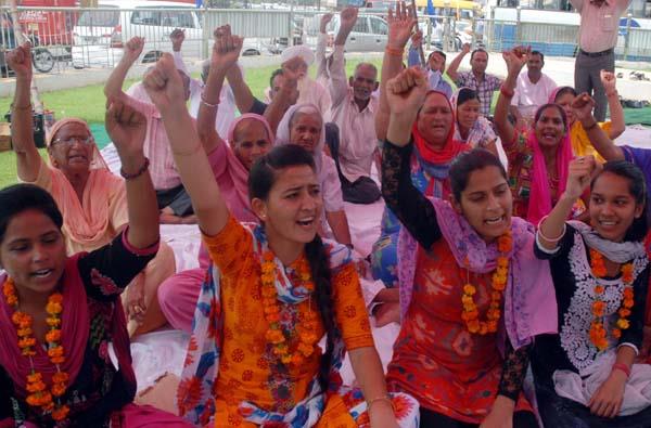 girls sitting on dharna then for college