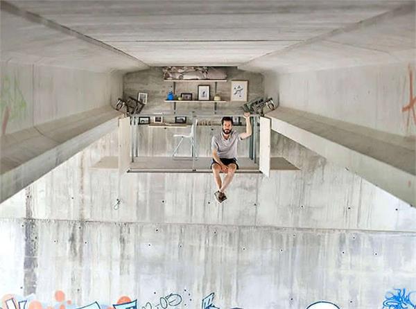 the artist s secret studio hangs at the bottom of the bridge see pictures 