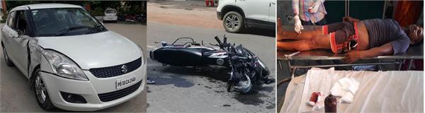 car and motorcycle collide