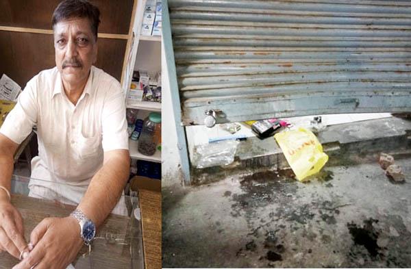 cashier  s goods stolen by breaking the shutter shop