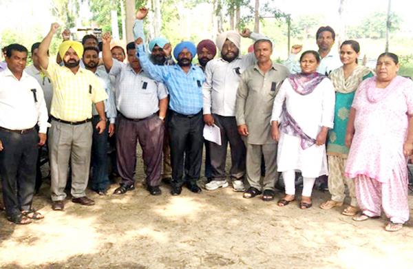 powercom employees rally by black badges