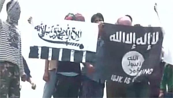 flags of is flown over srinagar jamia mosque