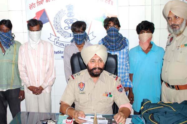 five members of the gang who robbed the passengers