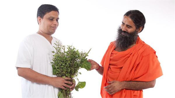 patanjali balkrishna top 10  among the 10 richest indians  ambani is at the top