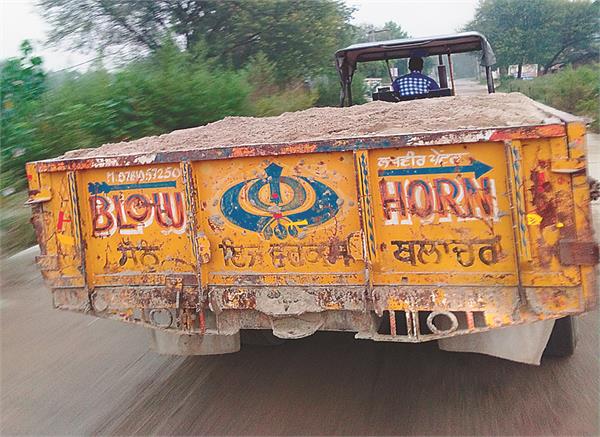 illegal mining  sand  road