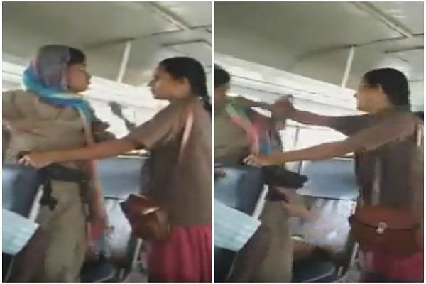 female policeman beaten woman conductor