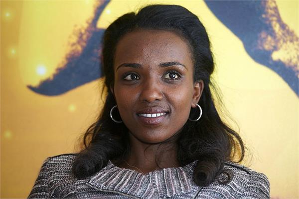 tirunesh dibaba  delhi half marathon