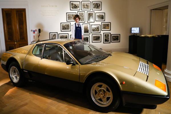 auctioned gold ferrari