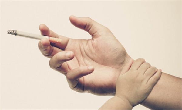 father s smoking can cause development lag in unborn kids