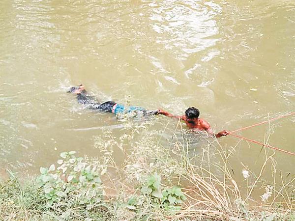 the young man jumped in the canal and committed suicide