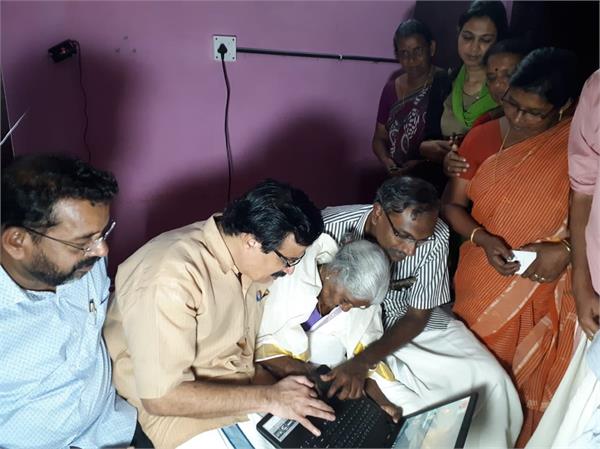 96 year old amma got laptop by education minister