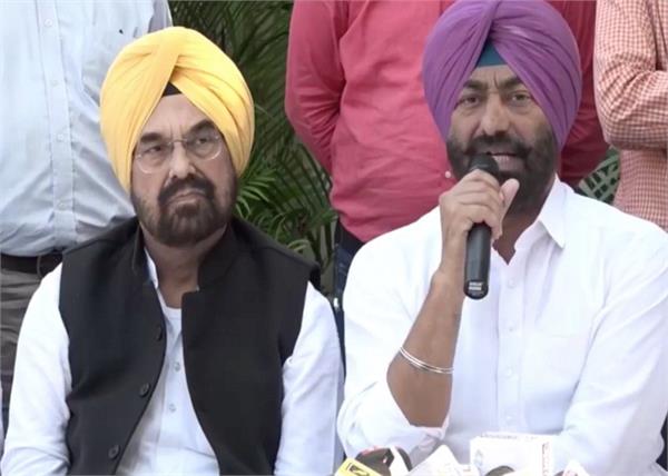 kejriwal  sukhpal singh khaira  photo