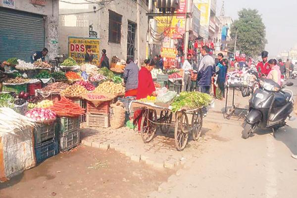 money is being levied in front of shops  poor people are taking looting