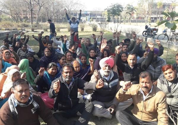 status of health department  4 workers protest