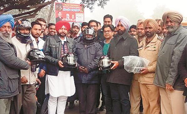 d  s  p  helmet distributed under the leadership of khaira