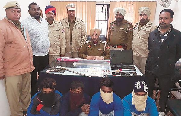 four arrested for robbery