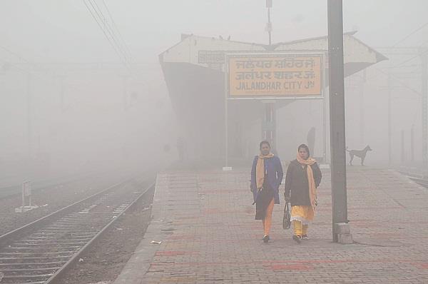fog blows all the trains lane  waiting for passengers