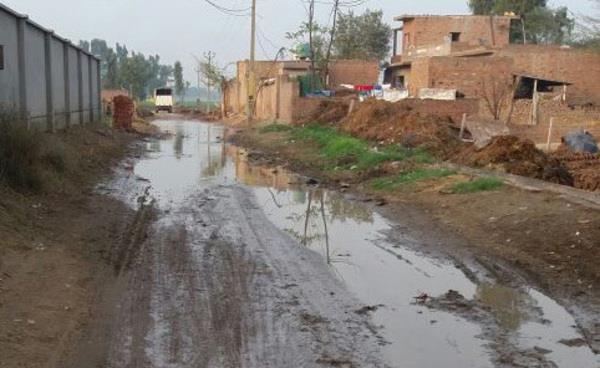 fear of spreading disease due to pond water gathered on the road