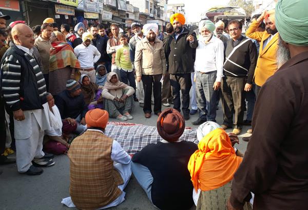family members kept dharna in the square