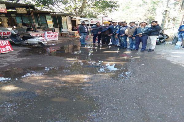 the sewerage overflow water spreads on the road
