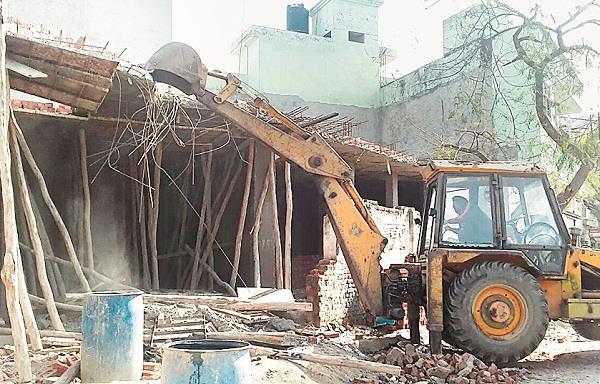 bjp leader sachar  s building breaks down with ditch