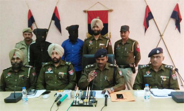 2 agents arrested