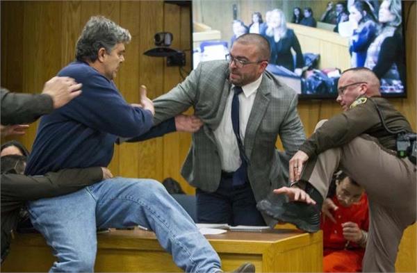 victims   father tries to attack larry nassar in court