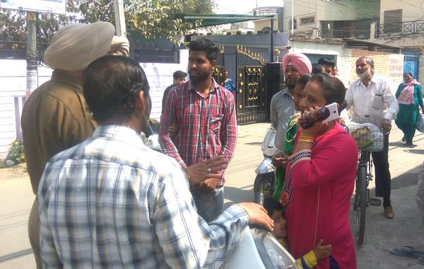 two youths on a high speed activist hit the woman